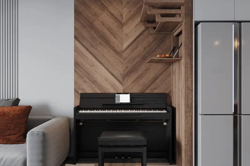 Piano numérique noir en meuble avec sa banquette, contre un mur en bois dans un salon